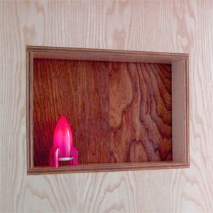 New Ash headboard with a cubby framing an existing Ash paneled wall