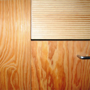 Custom textured fir drawer and marine plywood cabinets